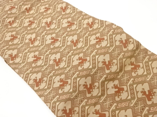 抽象鳥獣に幾何学模様織出し名古屋帯